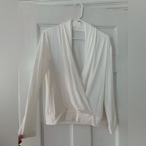 Thin white opened front blouse